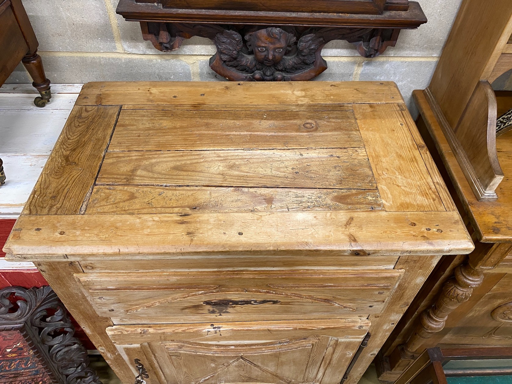 A 19th century French pine side cabinet, width 82cm, depth 53cm, height 113cm